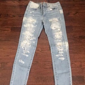 Distressed light wash skinny jeans